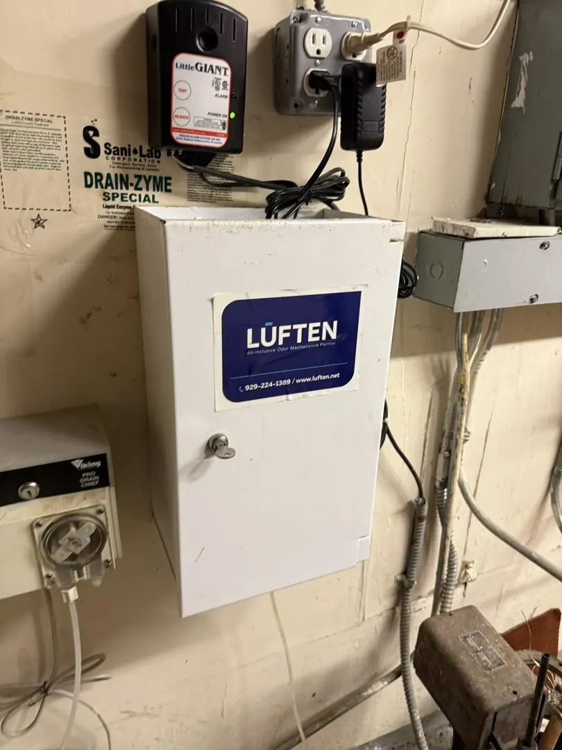 Luften drain treatment cabinet installed in a building mechanical room