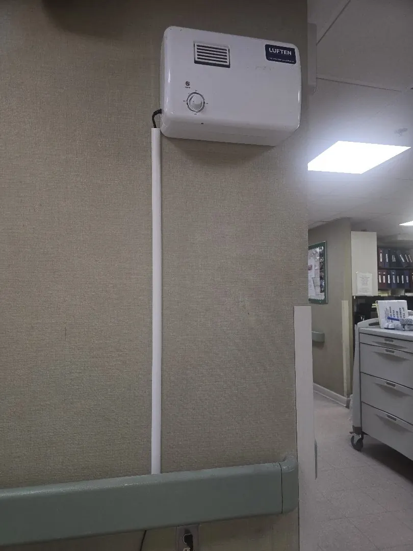 Luften odor-control unit in a healthcare facility corridor