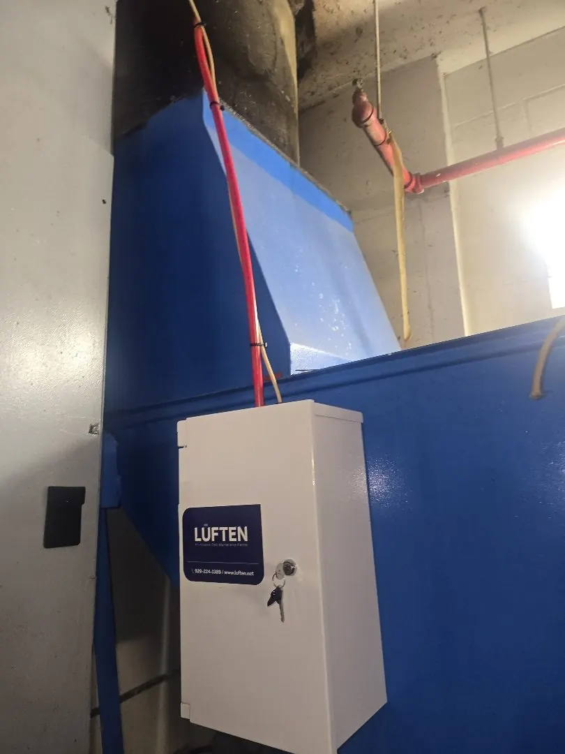 Example of a Luften trash compactor odor-control installation